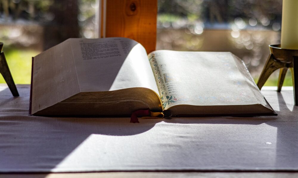 an open book sitting on top of a table