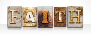 Word Faith spelled out in rusted metal cutout font.
